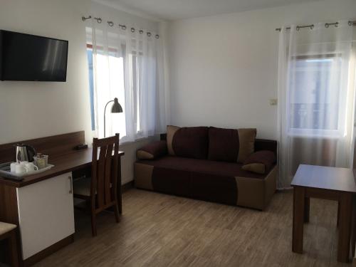 Posezení v ubytování Posejdon Pokoje Gościnne