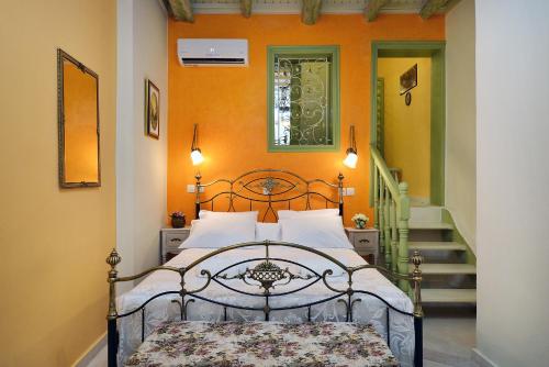 Llit o llits en una habitació de Casa della Favola Boutique Hotel
