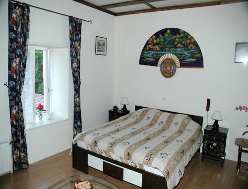 Una cama o camas en una habitación de B&B Mirage