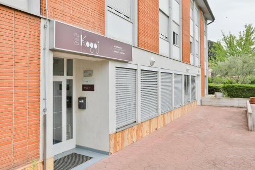 an external view of a building with a row of windows at Bed and Breakfast Kogoj in Nova Gorica