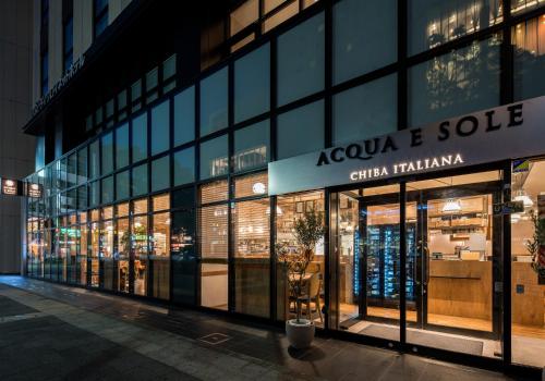 a store front of a building with glass windows at Daiwa Roynet Hotel Chiba-chuo in Chiba