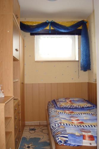 Säng eller sängar i ett rum på Schöne, gemütliche Wohnung