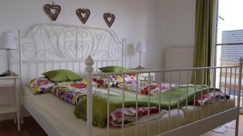 Cama o camas de una habitación en Gästehaus Elfriede