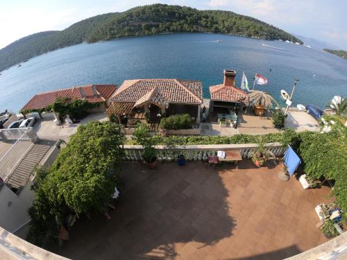 an aerial view of a house next to the water at Sea House Mljet in Polače