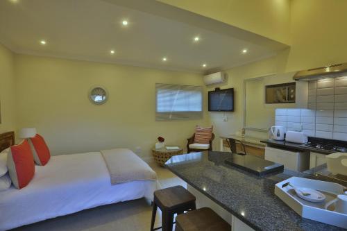 Η κουζίνα ή μικρή κουζίνα στο Andante Lodge