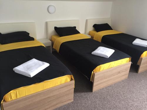 Katil atau katil-katil dalam bilik di Resort Zafaran by H&H
