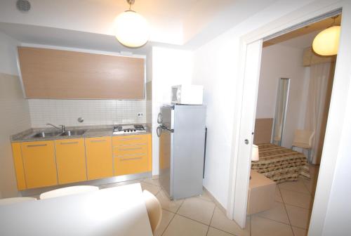 Kuchyň nebo kuchyňský kout v ubytování Ashanti Aparthotel Wellness&Spa