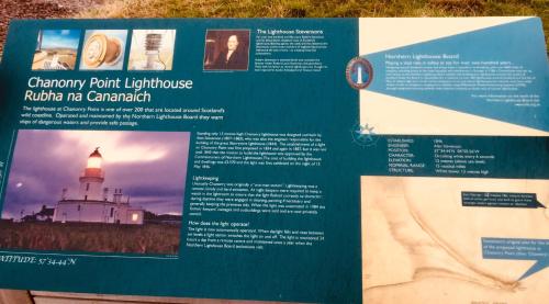 a sign for a lighthouse on the beach at Tigh Na Mara Guest House Rosemarkie- breakfast optional in Rosemarkie