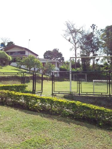 a soccer field with a goal in the grass at Parcelación El Lago in Cali