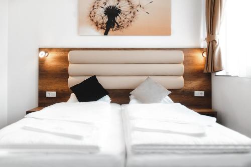 Ένα ή περισσότερα κρεβάτια σε δωμάτιο στο Hotel Castle Rastatt
