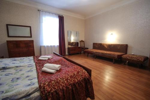 Postel nebo postele na pokoji v ubytování Eka&Nino GuestHouse