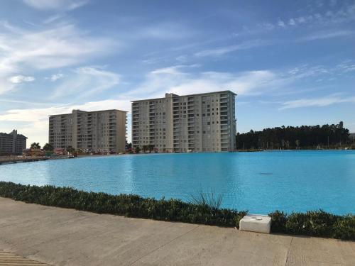 Bazén v ubytování Laguna Bahía Algarrobo nebo v jeho okolí