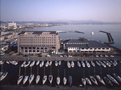 an aerial view of a marina with boats docked at Kitabiwako Hotel Grazie in Nagahama