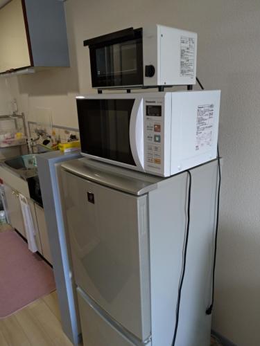 Η κουζίνα ή μικρή κουζίνα στο 短期賃貸ビッグバーンズマンション田上