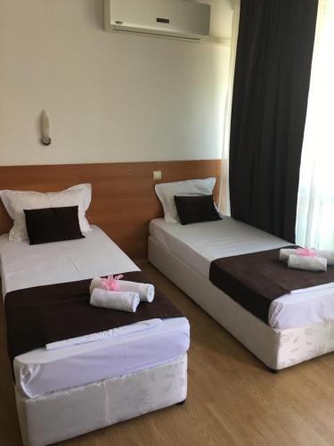 Katil atau katil-katil dalam bilik di Dreams Family Hotel
