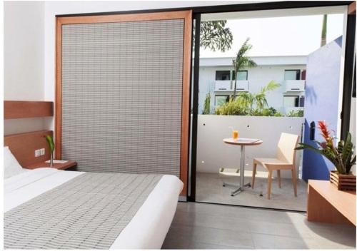 Voodi või voodid majutusasutuse ONOMO Hotel Abidjan toas