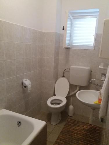 Koupelna v ubytování Apartman Nona