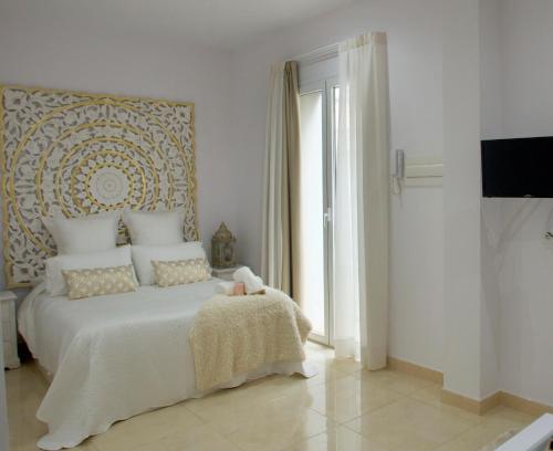Lova arba lovos apgyvendinimo įstaigoje Luxury Dreams Sevilla