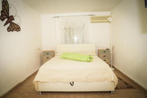 Łóżko lub łóżka w pokoju w obiekcie Master hosting Gal