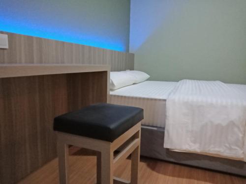 Postel nebo postele na pokoji v ubytování SleepRest @ Golden Prima