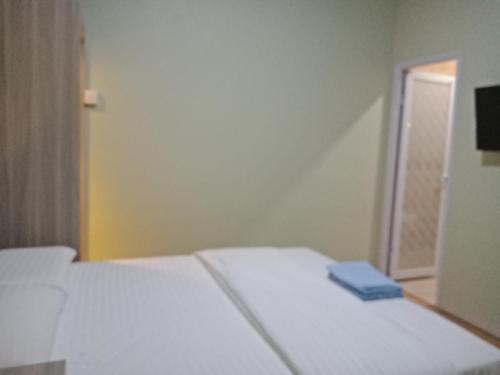 Postel nebo postele na pokoji v ubytování SleepRest @ Golden Prima
