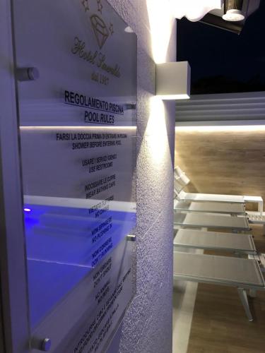 a sign that says redeco imagined rental food miles at Hotel Smeraldo in Qualiano