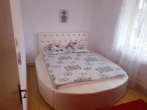 Ένα ή περισσότερα κρεβάτια σε δωμάτιο στο Apartament Central Miguel