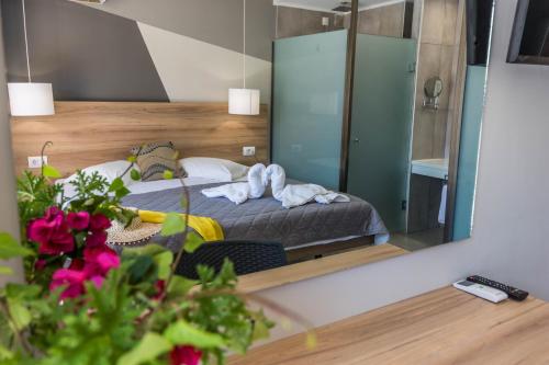 Katil atau katil-katil dalam bilik di Exotica Hotel & Spa by Zante Plaza