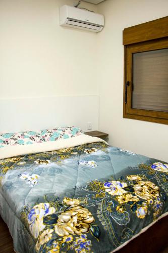 Katil atau katil-katil dalam bilik di Apartamentos Zidane