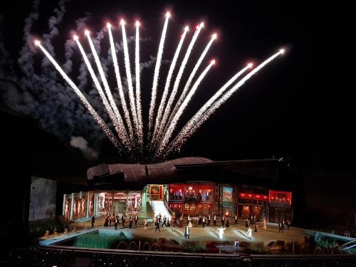 a fireworks display in the sky over a building at Seesuiten Mörbisch in Mörbisch am See