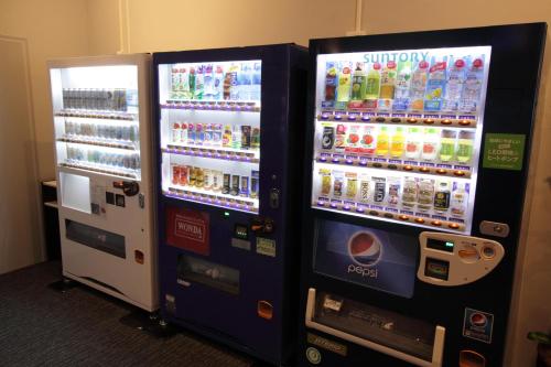 two vending machines are next to each other at Takamatsu Century Hotel in Takamatsu