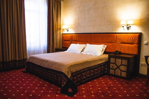 Postel nebo postele na pokoji v ubytování Hotel Mastara