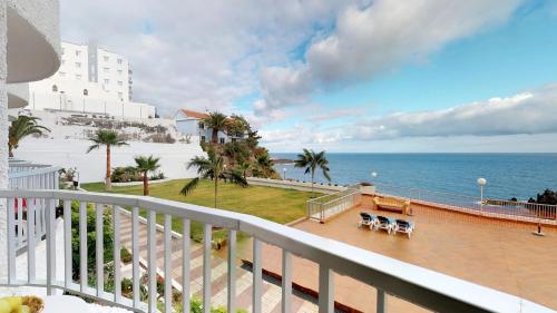 a balcony with a view of the ocean at Cosy 0cean View Studio 1 in Icod de los Vinos