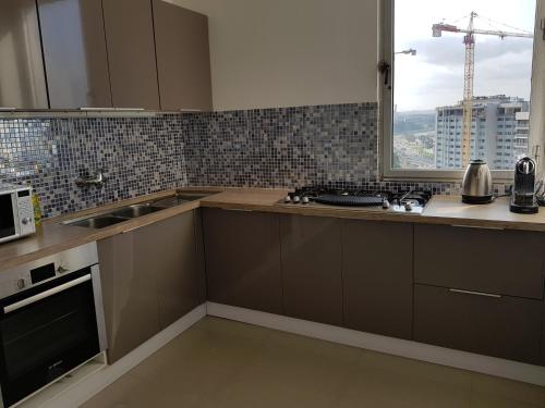 Küche/Küchenzeile in der Unterkunft Appartements Lamblin