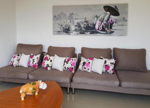 Ein Sitzbereich in der Unterkunft Appartements Lamblin