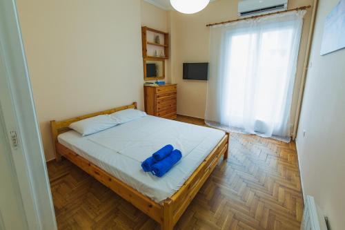 Postel nebo postele na pokoji v ubytování VIP Greece Petros