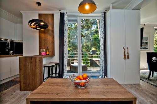 Η κουζίνα ή μικρή κουζίνα στο BlueApart Apartamenty Jurata