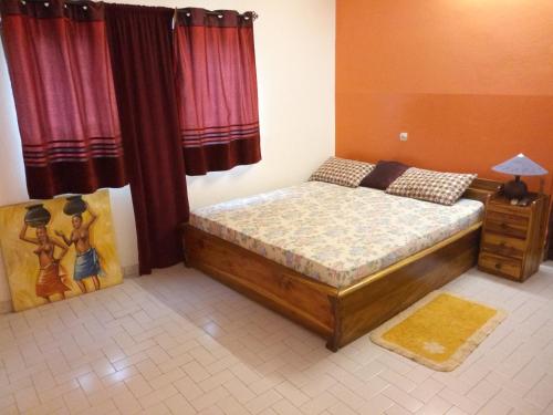 Posteľ alebo postele v izbe v ubytovaní Cloud9 Lomé