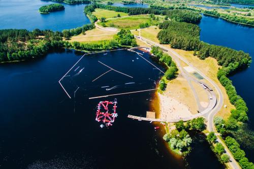 an aerial view of an island in a lake at Česlovos sodyba in Zarasai