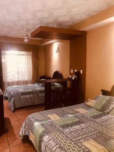 Un ou plusieurs lits dans un hébergement de l'établissement Melrost Airport Bed & Breakfast