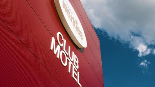 a close up of a sign for a car dealership at Lithgow Workies Club Motel in Lithgow