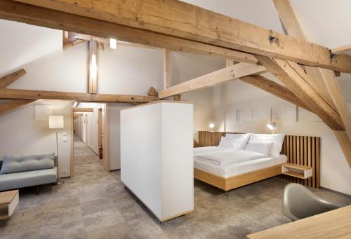 A bed or beds in a room at Hotel Kleis