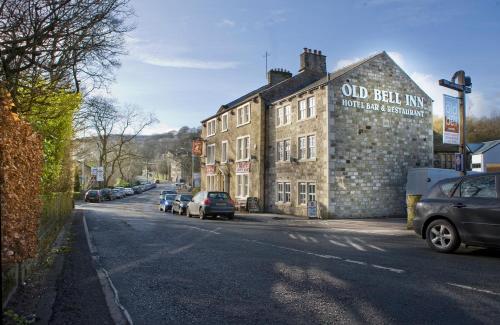 an old building on the side of a street at The Old Bell Inn in Oldham