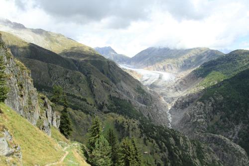 a view of a mountain valley with a river at Chämihitta in Blatten bei Naters