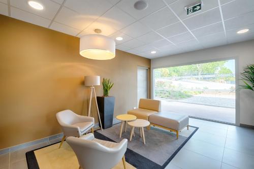 Гостиная зона в B&B HOTEL Marseille La Valentine St Menet