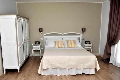 Кровать или кровати в номере Il Casale Della Gioia