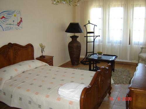 Кровать или кровати в номере Smaragdi Luxury Apartments