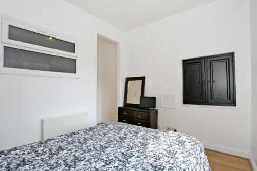 Postel nebo postele na pokoji v ubytování Aspect Apartments City Centre