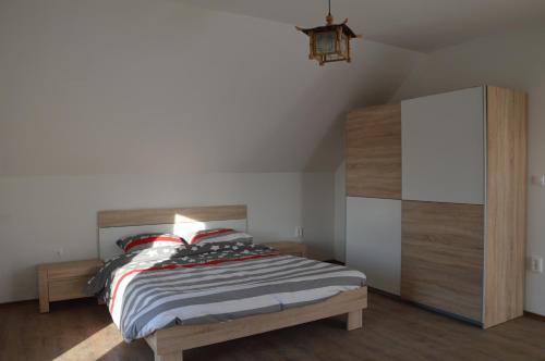 A bed or beds in a room at Balatonview - villa Myriam