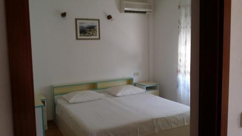 Posteľ alebo postele v izbe v ubytovaní Apartment Maca